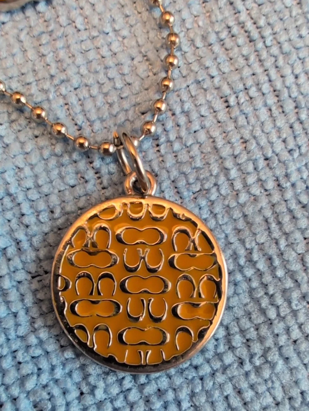 Coach Round Enamel Hangtag